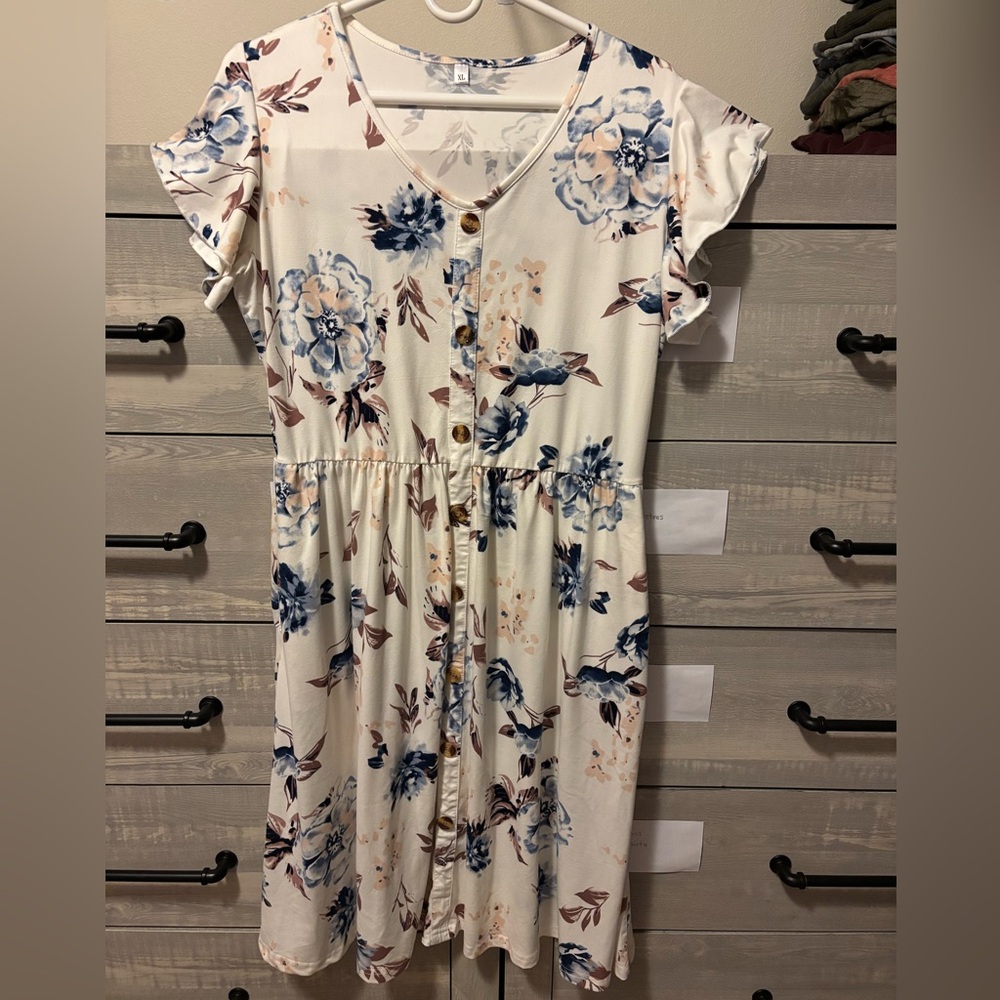 Over-the-head dress with flutter sleeves and pockets!